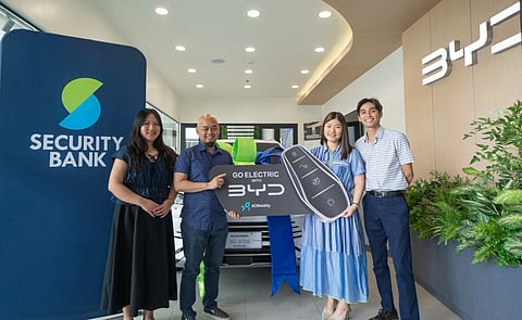 MARC Dave Gonzales, (second from left) receives the ceremonial keys to a brand-new BYD Sealion 6 DM-i which he won as the lucky winner of Security Bank’s 12 Gifts of Christmas Raffle Promo draw. Present with him at the handover ceremony at BYD Alabang are (from left) Security Bank Deposit and Payroll marketing manager Katrina D. Aurellano, Candice Chee, CASA Growth and Retention head; and Fortunato Miguel Gupit, CASA Growth and Retention manager.