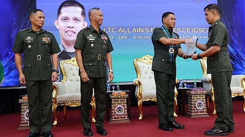 ROMEO Brawner Jr. (center), Chief of Staff of the Armed Forces of the Philippines, together with Jonjie C. Juguilon and Donald C. Hugo, presents a plaque of recognition to one of the Best Battalions of the AFP Corps of Engineers during its 89th Founding Anniversary at Camp Aguinaldo on Thursday.