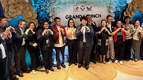 ALAGANG OWWA Department of Migrant Workers Secretary Hans Leo J. Cacdac (5th from left) and Overseas Workers Welfare Administration Administrator Patricia Yvonne ‘PY’ Caunan (7th from left) led the grand launch of the Seafarers’ Wellness Center that brings together legal, medical and welfare services in one accessible hub for seafarers and their families.