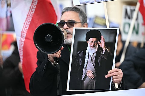 US embassy attacked in Baghdad, strikes hit Iran-backed fighters