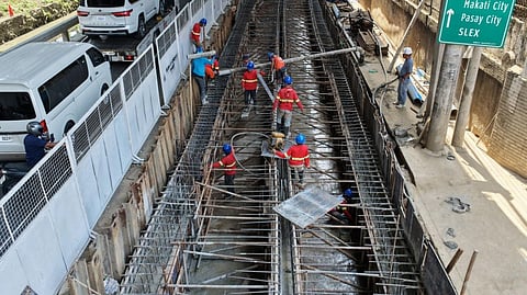 CONSTRUCTION continues on a detention basin along G. Araneta Avenue in Quezon City, a flood-control project spanning Barangays Sto. Domingo and Siena designed to temporarily store rainwater and ease chronic flooding in the area.