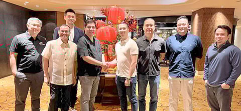 TOGETHER with PBA commissioner Willie Marcial (center), Jacque Ruby (second from left) is one of the prime movers in the entry of the Macau Black Knights to the PBA.