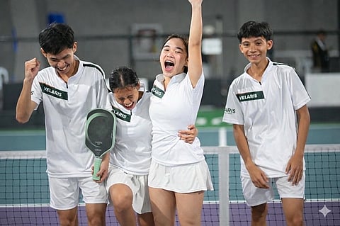 ROSE Bacaron raises her arm in triumph as Team Velaris — (from left) Alva Bual, Jean Indagacan and Sun Lacida — celebrates after capturing the PCL Rising Stars U19 crown in a thrilling finale in Cebu City over the weekend.