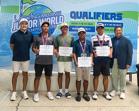 THE four qualifiers in the 15-18 division of the USwing Mojing Junior World Championship are flanked by Junior Golf Foundation of the Philippines director Mark Dy (extreme left) and National Golf Association of the Philippines secretary-general Bones Floro. They are (from left) Rafael Leonio, Emil Hernandez, Patrick Tambalque and Roman Ungco.