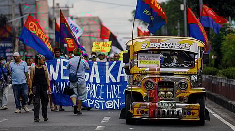 TRANSPORT groups, along with other multi-sectoral groups, march towards Mendiola in Manila on Friday as part of their two-day transport strike amid soaring fuel prices due to the rising conflict in the Middle East.