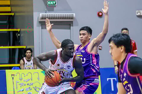 ALPHA Bah muscles his way to an 18-point performance to power LPU-B to a 79-76 win over CEU in the PGFlex-UCAL basketball tournament on Thursday.