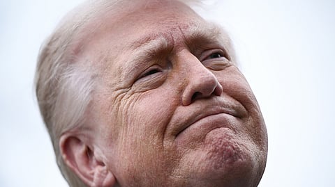 UNITED States President Donald Trump speaks to journalists before boarding Marine One as he departs from the South Lawn of the White House in Washington, DC, on 20 March 2026 for his Mar-a-Lago residence, where he will spend the weekend.