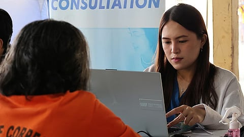 A SOCIAL worker checks on a woman inmate at the Correctional Institution for Women in Mandaluyong City during a healthcare drive for persons deprived of liberty.