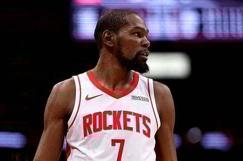 Kevin Durant #7 of the Houston Rockets looks on during the game between the Miami Heat and the Houston Rockets at Toyota Center on March 21, 2026 in Houston, Texas