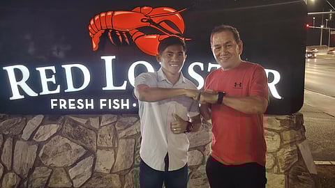 IBF minimumweight champion Pedro Taduran and trainer Carl Peñalosa take a brief break from training in Las Vegas.