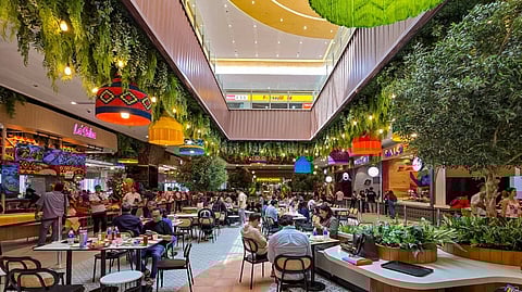MALLGOERS enjoy the local delicacies at the food court inside the newly-opened SM City Zamboanga.