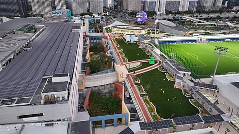 SOLAR panels line the MOA Sky walkway at SM Mall of Asia, seamlessly integrated into the structure to generate clean energy while providing shaded paths for mallgoers.