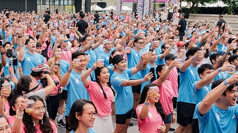 PARTICIPANTS raise their drinks during Lazada’s 14th anniversary celebration, contributing to a Guinness World Record for the largest toast with soft drinks held across multiple venues.