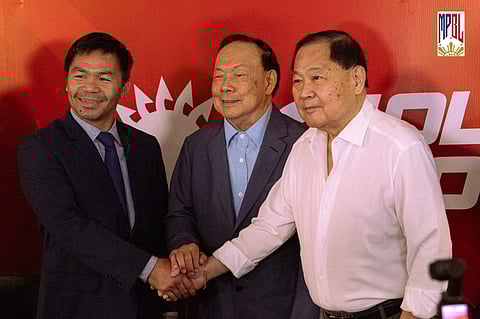 MPBL founder and chairman Manny Pacquiao (left) shakes hands with Wilson (middle) and William Tieng of Solar Sports, formalizing the renewal of their broadcast partnership.