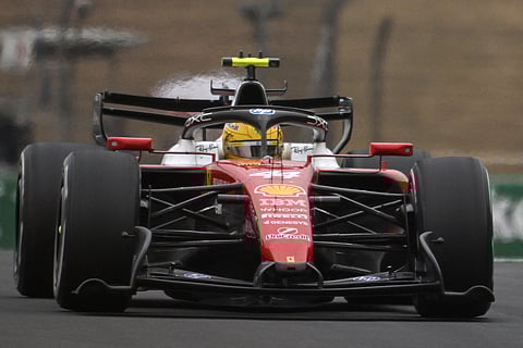 FERRARI driver Lewis Hamilton pushes through the field during a race that marked his early-season resurgence.