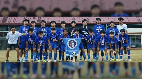 THE Ateneo de Manila Midgets B celebrates after beating Claret School of Quezon City to defend their Rizal Football Association Football Tournament crown recently.