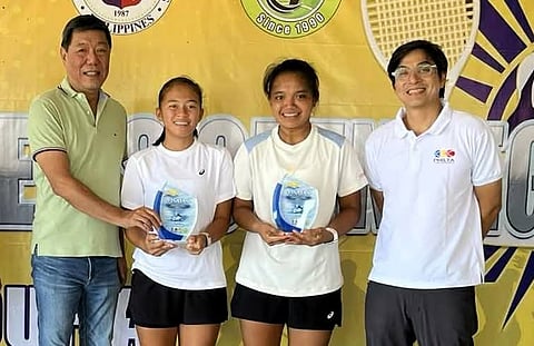 TENNIELLE Madis (second from right) and Stefi Aludo pose with San Carlos City Mayor Renato Gustilo (left) and Philta secretary general John Rey Tiangco after figuring in the finals of the Philta Women’s National Open at the San Carlos Tennis Center in Negros Occidental.
