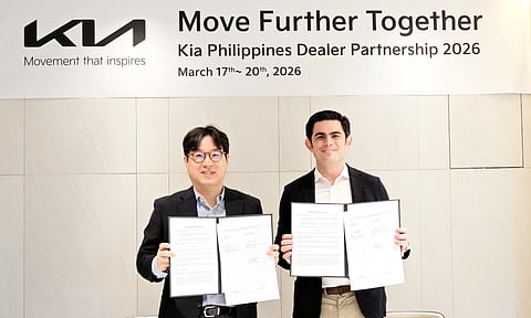 TAE-HUN Lee, executive vice president, head of Global Operations Division (left), with Jaime Zobel de Ayala, CEO of ACMobility (right), at the distributor agreement extension signing.