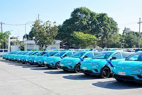 FLEET of Green Xentro electric taxis lines up as part of the 2,500-unit deployment.