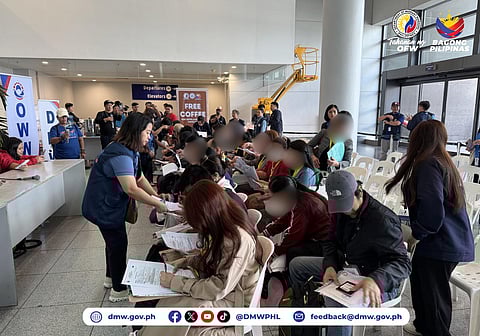 99 Filipinos return from Kuwait amid Middle East tensions