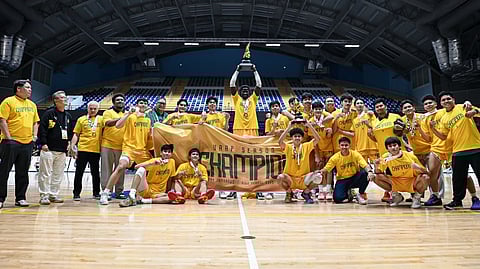 THE FEU-D Baby Tamaraws celebrate after beating the NUNS Bullpups, 106-102, to capture the Season 88 UAAP high school boys basketball title late Monday.