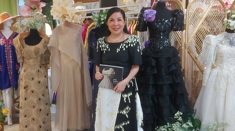 FASHION designer, author and culinary instructor Vicky Veloso Barrera holding her new book ‘Love, Marina.’