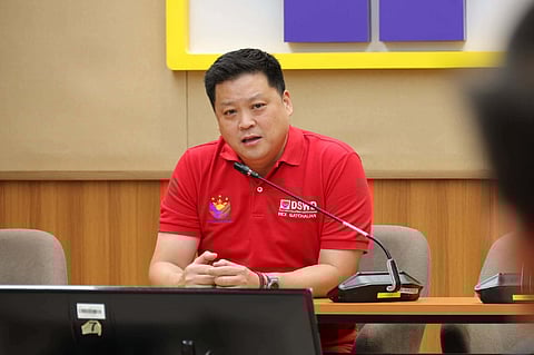 Department of Social Welfare and Development Secretary Rex Gatchalian during a forum with motorcycle taxi operators to discuss the upcoming special payouts for riders this Wednesday.