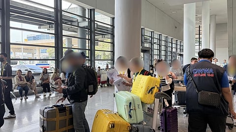 Gov’t welcomes 99 OFWs from Kuwait