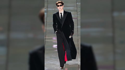 BLENDING icy charisma and cyberpunk flair, Zhang Linghe redefines what a single strut can do.