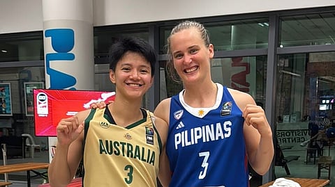 AFRIL Bernardino of the Philippines and Kristy Wallace of Australia smile after swapping jerseys following their final encounter in the FIBA 3x3 Asia Cup in Singapore last Sunday.