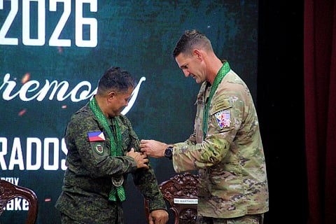US Army 25th Infantry Division Commanding General Major General James Bartholomees attaches the Salaknib 2026 patch to the shoulder of Philippine Army Vice Commander Maj. Gen. Efren F. Morados during the opening ceremony of the Salaknib 2026 held at Fort Magsaysay in Palayan City, Nueva Ecija on April 6, 2026.