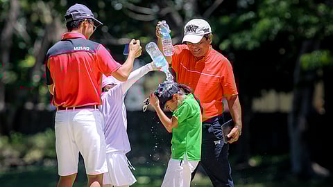 AKEISHA Yocte gets a victory shower after outlasting Vanya Go to capture the girls’ 7-10 title of the ICTSI Mactan Island Junior PGT Championship on Thursday.