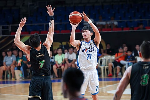 CJ Cansino leads Meralco Bolts anew in their win against Macau Black Bears.