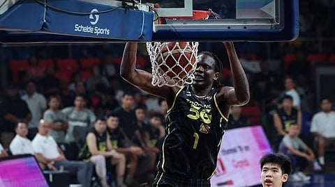 BOL Bol lights up the TNT scoreboard en route to a 101-89 win over Terrafirma in the PBA Commissioner’s Cup on Saturday at the Ninoy Aquino Stadium.