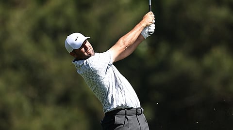 SCOTTIE Scheffler struggles crossing water hazards during the second rounf of the 90th Masters at Augusta National on Friday.