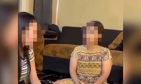 Women face jail for stepping on Quran