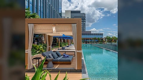 RESORT-style serenity in the city — private cabanas, a sleek pool, and skyline views redefine the urban escape.