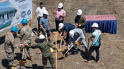 TROOPS from the Philippines and the United States break ground for new classrooms as they aim to serve residents and turn over school equipment in Quezon province.