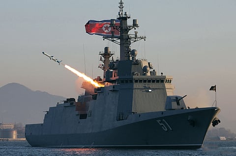 THIS picture taken on 12 April and released by North Korea’s official Korean Central News Agency on 14 April shows the destroyer Choe Hyon conducting a test-fire of a missile at an undisclosed location in North Korea.