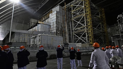 REPRESENTATIVES of Greenpeace and the media visit the no longer working 3rd block at the Chornobyl Nuclear Power Plant on 9 April. An uncontrolled collapse of the internal radiation shell at the defunct Chernobyl nuclear power station in Ukraine could increase the risk of radioactivity release in the environment, Greenpeace warned on 14 April 2026.