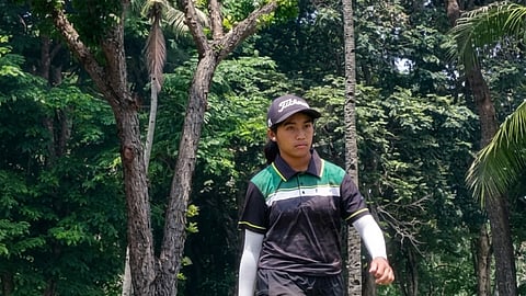 BRITTANY Tamayo walks off the ninth green after shooting a 73 in the JGFP World Team Championships in Davao City.