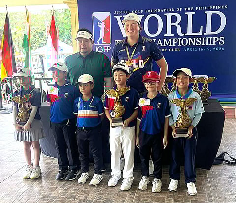 LAURO Delen, Alonso Fabul, Andres Jeturian, and Connor Blake Sy of the Philippines 1 squad celebrate after capturing the 8-and-under division title in the JGFP World Team Championships. Joining them are individual winners Stephanie Gan (extreme left) and Ethan Lago (extreme right), along with JGFP president Oliver Gan and Asian Tour regular Carson Herron at Apo Golf and Country Club in Davao City.