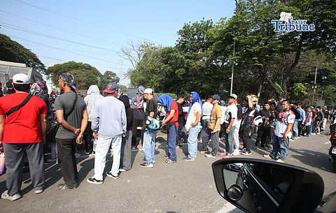 (April 18 2026) Unlisted motorcycle taxi queuing at Quezon City Circle on Saturday April 18 2026, to claim their P5000 cash aid assistance from DSWD. Photo/Analy Labor