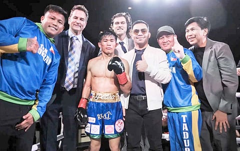 IBF champion Pedro Taduran and his team beam with pride after scoring a seventh-round knockout win over Mexican Gustavo Perez Alvarez two weeks ago in the US.