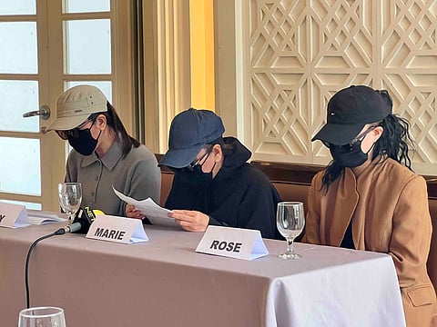 The three wives of Filipino seafarers who pleaded for help to President Ferdinand Marcos Jr. on Saturday in a press briefing in Manila.