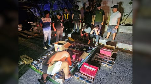AUTHORITIES inspect the approximately 41 kilograms of suspected shabu seized during a buy-bust operation in Barangay Balingasa, Quezon City which also saw the arrest of two Chinese nationals.
