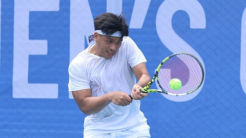 UNIVERSITY of the Philippines bet Lance Jacob Fernandez displays his solid form in beating Hilbert San Jose, 6-0, 7-6 (3) to reach the third round of the Philta Men’s National Open on Tuesday at the Rizal Memorial Tennis Center in Manila.