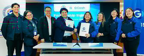 (L-R) GCash overseas head Alfonso Garcia; Overseas Workers Welfare Administration deputy administrator for administration and fund management Atty. Jasmine Anne Gapatan; deputy administrator for policy development and strategic partnerships Ryan Vincent Uy; administrator Patricia Yvonne Caunan; GCash vice president and head for public sector Cleo Santos; chief regulatory officer Atty. Cef Sison; public sector national government head Jamie Tiu; and public sector national accounts manager Alda Lou Cabrera