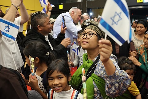 Members of the Bnei Menashe (Sons of Manasseh) community from India react as they arrive at Ben Gurion Airport in Lod, near Tel Aviv, on 23 April 2026.