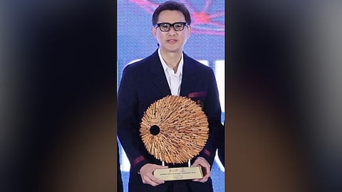 SM Supermalls president Steven Tan receives a plaque of appreciation from Philippine Franchise Association officials during the opening of the Franchise Asia Philippines 2026 International Franchise Conference at the SMX Convention Center in Pasay City.